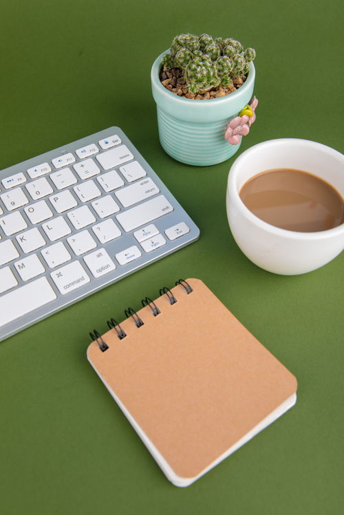 键盘记事本办公用品商务摄影图的艺术与应用